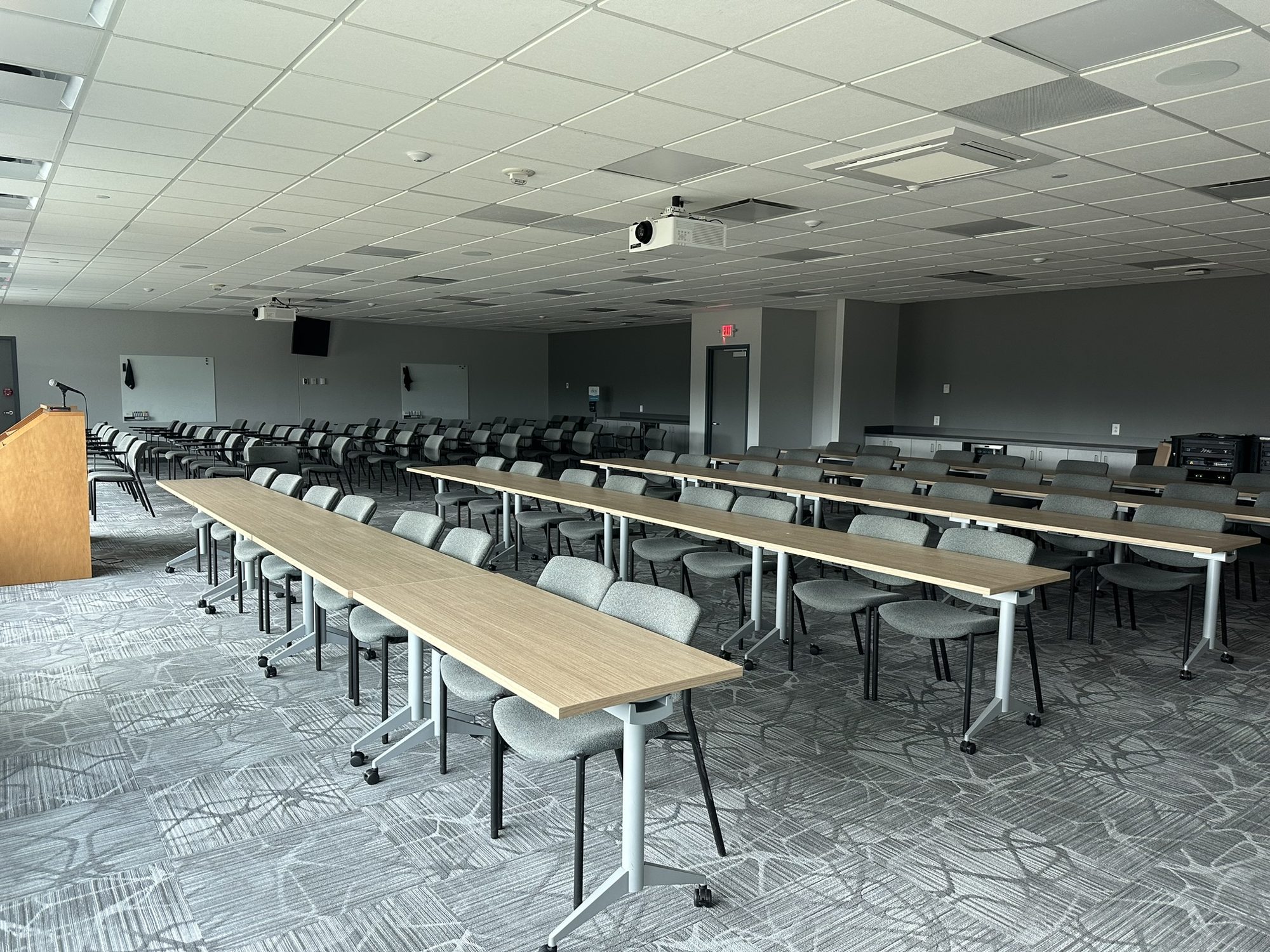 Finished conference space with integrated ceiling systems